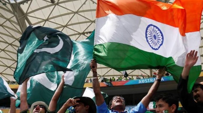 Fans of Pakistan's cricket team and India's cheer in the stands before Pakistan's Cricket World Cup match against India in Adelaide বিসিসিআইয়ের কাছে পাকিস্থান ক্রিকেট চাইল ৫০০ কোটি টাকা, জেনে নিন কারণকি?